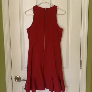 Banana Republic red ponte’ knit dress with bottom pleated ruffle and silver zip.
